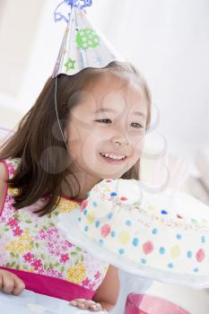 Royalty Free Photo of a Little Girl With a Birthday Cake