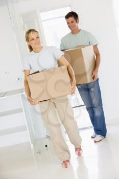 Royalty Free Photo of a Couple Moving Into a New Home
