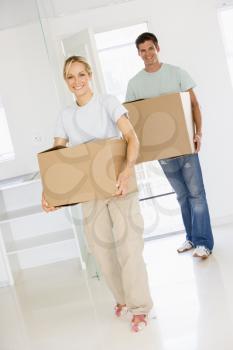 Royalty Free Photo of a Couple Moving In to a New Home