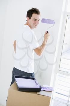 Royalty Free Photo of a Man Painting