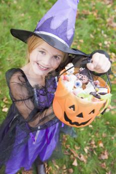 Royalty Free Photo of a Girl in a Witch Costume