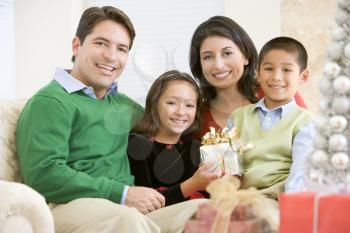 Royalty Free Photo of a Family at Christmas
