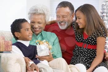 Royalty Free Photo of Grandparents and Grandchildren at Christmas