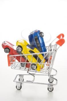 Royalty Free Photo of a Shopping Cart With Cars