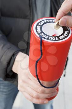 Royalty Free Photo of a Person Donating to Charity
