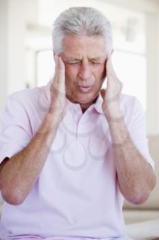Royalty Free Photo of a Man With a Headache