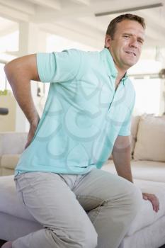 Royalty Free Photo of a Man With Back Pain