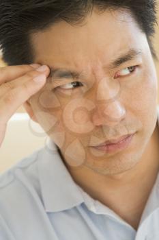 Royalty Free Photo of a Man With a Headache