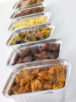 Royalty Free Photo of a Selection Of Indian Takeaway Dishes In Foil Containers