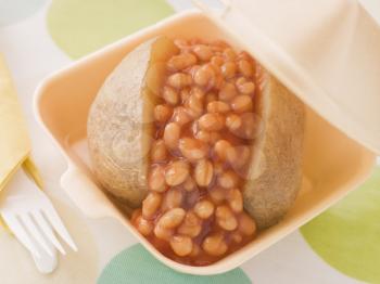 Royalty Free Photo of a Baked Potato With Baked Beans