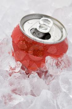 Royalty Free Photo of a Can of Pop on Ice