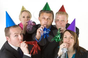 Royalty Free Photo of a Business Team Wearing Party Hats