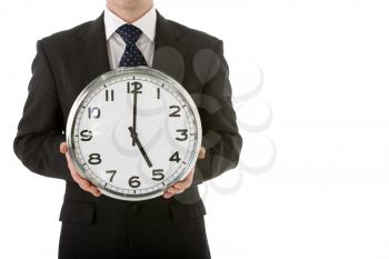Royalty Free Photo of a Businessman Holding a Clock