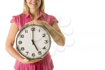 Royalty Free Photo of a Woman With a Clock Showing 5 PM