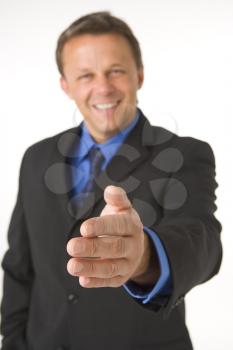Royalty Free Photo of a Man Extending a Hand