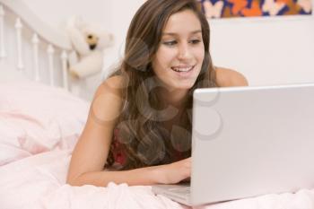Royalty Free Photo of a Girl With a Laptop