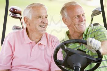 Royalty Free Photo of Two Men in a Golf Cart