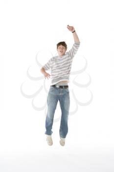 Royalty Free Photo of a Teenager Jumping in the Air