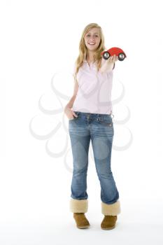 Royalty Free Photo of a Girl With a Model Car