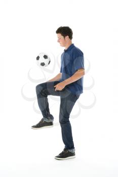 Royalty Free Photo of a Boy With a Soccer Boy