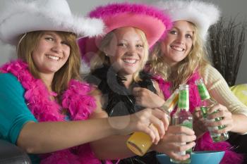 Royalty Free Photo of Girls Dressed Up and Drinking