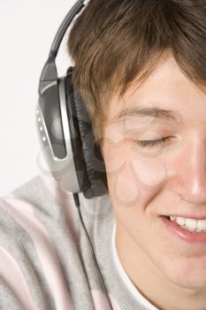 Royalty Free Photo of a Boy Listening to Music