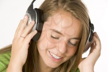 Royalty Free Photo of Girl Listening to Headphones