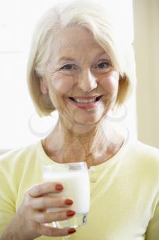 Royalty Free Photo of a Woman Drinking Milk