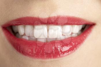 Royalty Free Photo of a Woman's Smiling Mouth