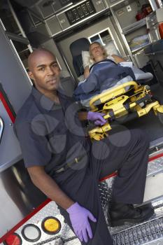 Royalty Free Photo of a Paramedic Waiting to Unload a Patient