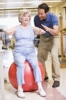 Royalty Free Photo of a Physiotherapist Working With a Patient