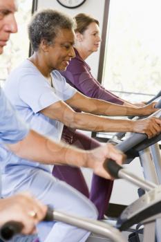 Royalty Free Photo of Patients on Exercise Equipment
