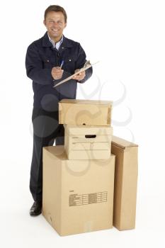 Royalty Free Photo of a Courier With Packages and a Clipboard