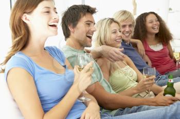 Royalty Free Photo of Boys and Girls Watching TV
