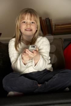 Royalty Free Photo of a Little Girl With a Remote Control