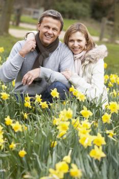 Royalty Free Photo of a Couple in Daffodils