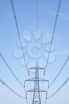 Royalty Free Photo of Electrical Lines Against a Blue Sky