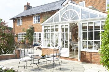 Royalty Free Photo of a House With a Conservatory