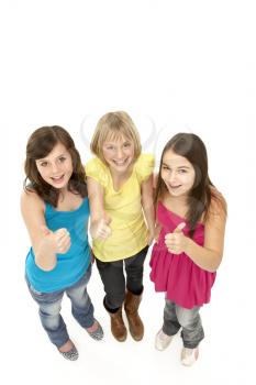 Royalty Free Photo of a Group of Three Girls Giving Thumbs Up