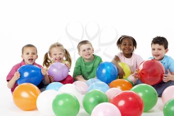 Royalty Free Photo of a Group of Children With Balloons