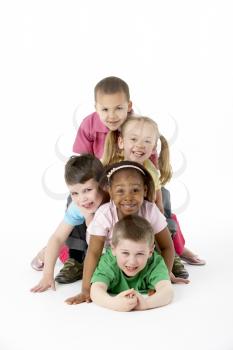 Royalty Free Photo of a Group of Youngsters Lying on the Floor