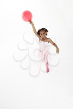 Young Girl Holding Party Balloon