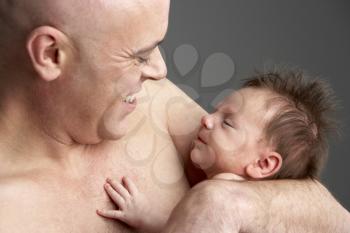 Royalty Free Photo of a Father and Baby