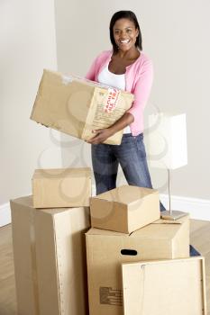 Royalty Free Photo of a Woman With Boxes