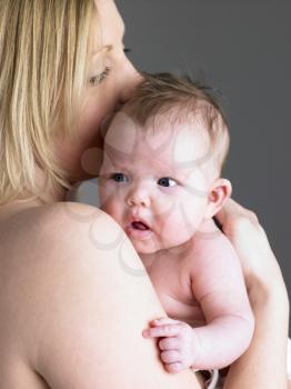 Royalty Free Photo of a Mother With a Baby