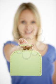 Royalty Free Photo of a Girl With a Small Suitcase