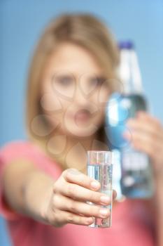 Royalty Free Photo of a Girl With a Drink