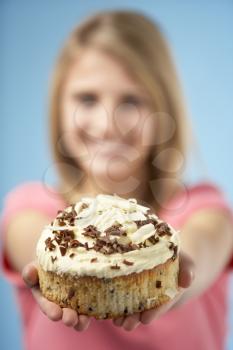 Royalty Free Photo of a Girl With a Cream Cake