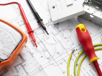 Royalty Free Photo of Electric Equipment on House Plans