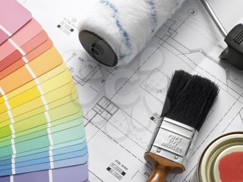 Royalty Free Photo of Paint Tools on House Plans